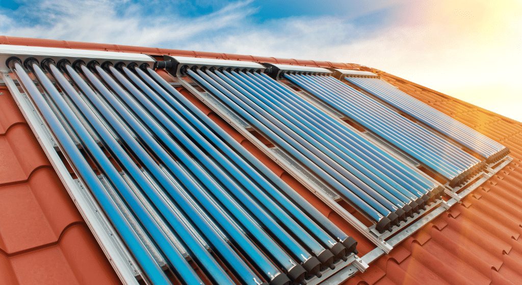A solar thermal collector installed on the tiled roof of a building. Installation is assessed during NVQ Level 2 Solar Collector Roofer