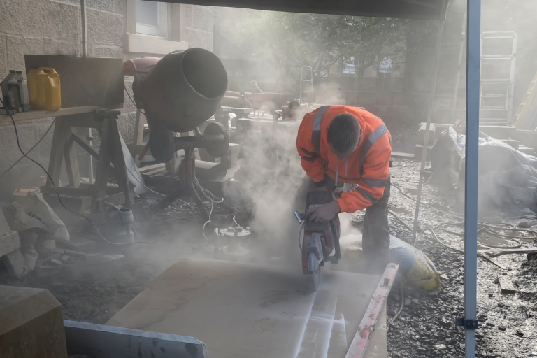 Skilled Construction Worker using site machinery